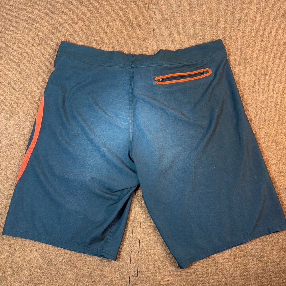 A+ Oakley Performance Fit Board Shorts Mens 38 Black Orange Ellipse Swim Trunks